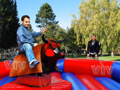 VIV mechanical rodeo bull attraction on an inflatable safety bed